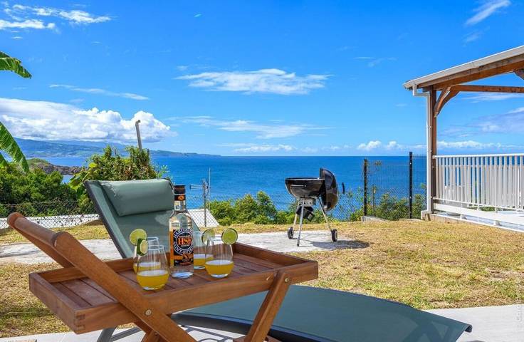 Location de vacances pour 8 personnes, avec vue ainsi que jardin et piscine dans Anse l'Etang - 4