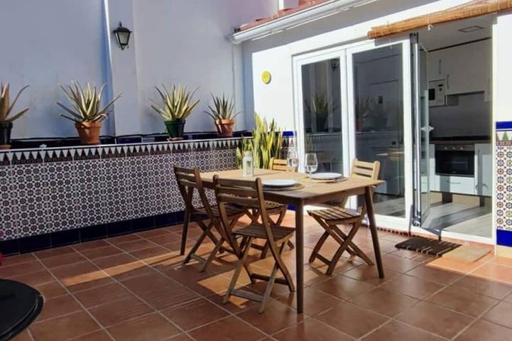 Entire apartment, Charming Andalusian house near beach with private patio in Málaga (Este), Malaga