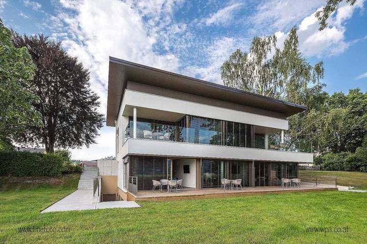 Ferienwohnung für 4 Personen, mit Terrasse und Garten sowie Sauna und Seeblick