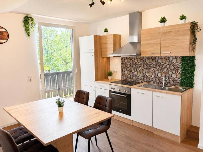 Ferienwohnung für 4 Personen, mit Balkon und Terrasse sowie Garten und Ausblick