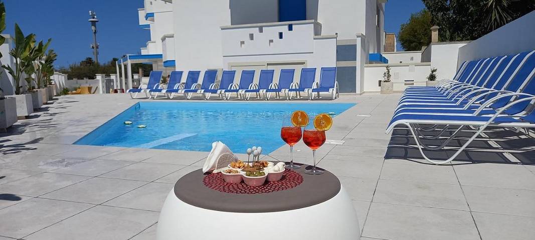 Appartamento per 3 persone, con panorama e giardino nonché piscina a Marina di Mancaversa