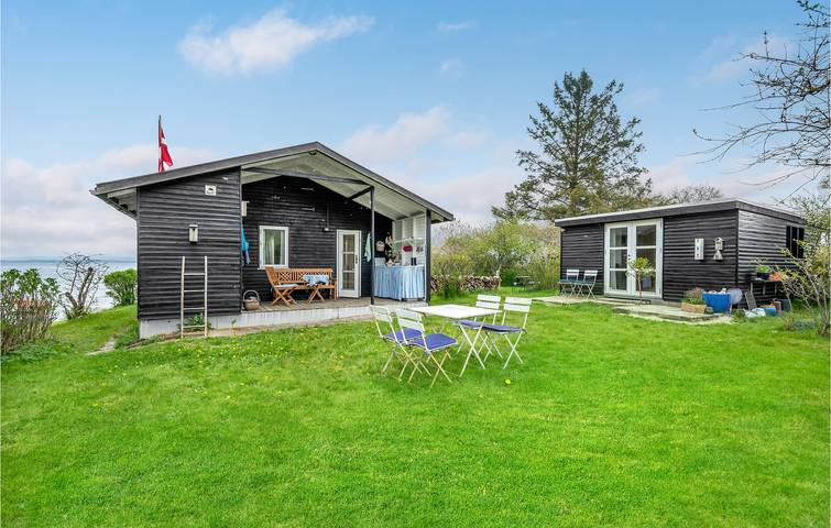 Ferienhaus für 4 Personen, mit Terrasse und Garten sowie Seeblick in Skanderborg