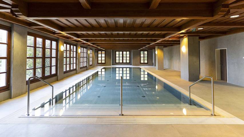 Ferienwohnung für 4 Personen, mit Balkon und Sauna sowie Pool in Treffen am Ossiacher See