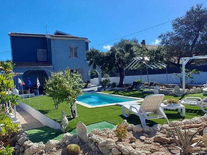 Casa vacanza per 2 persone, con Terrazza e Giardino nonché Piscina e Panorama a Sassari