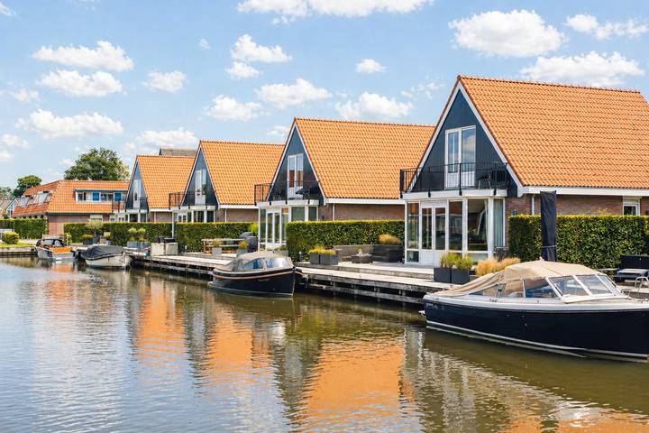 Ferienhaus für 4 Personen, mit Balkon und Balkon/Terrasse sowie Terrasse und Garten