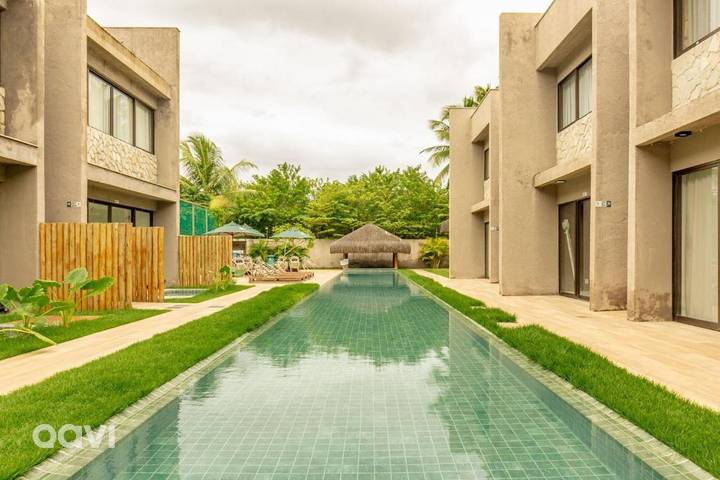 Casas e apartamentos de temporada para 2 pessoas, com jardim e piscina em Praia do Toque