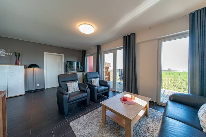 Ferienwohnung für 4 Personen, mit Balkon und Whirlpool sowie Sauna in Schillig