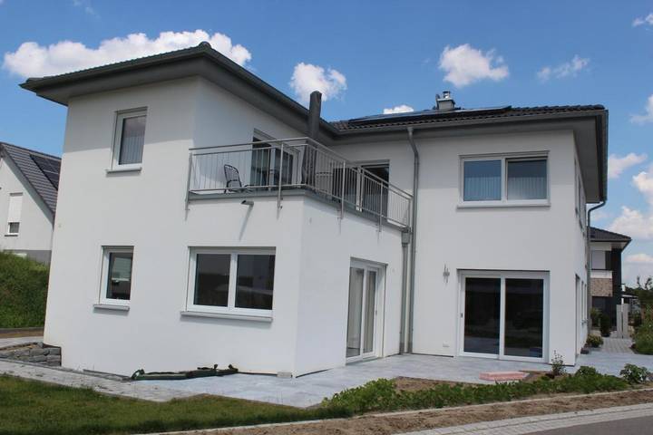 Ferienwohnung für 4 Personen, mit Balkon und Terrasse sowie Garten und Ausblick in Bad Schussenried