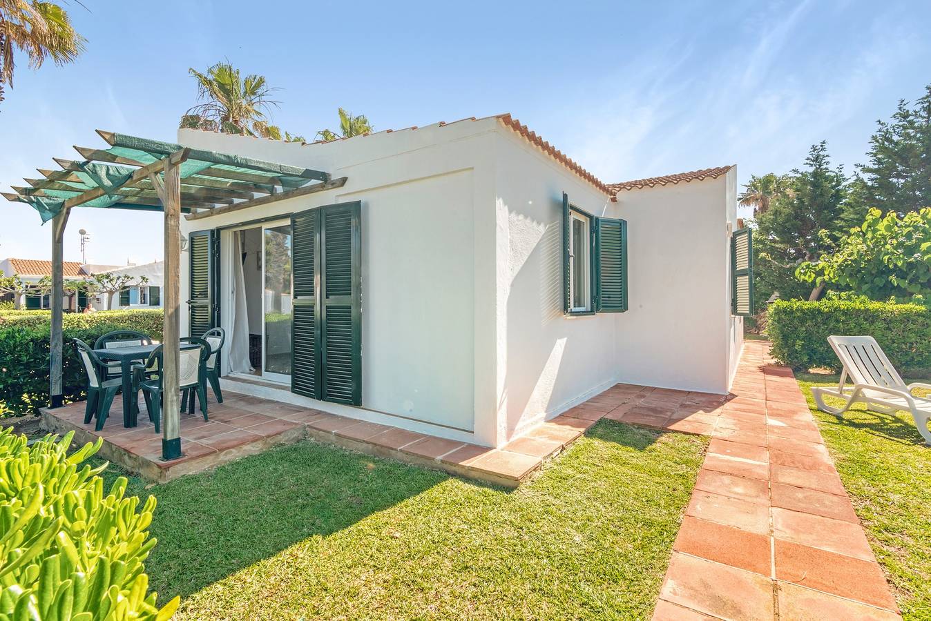 Casa de vacaciones 'Sa Calma House' con piscina compartida, terraza privada y aire acondicionado in Cap d'Artrutx, Ciudadela