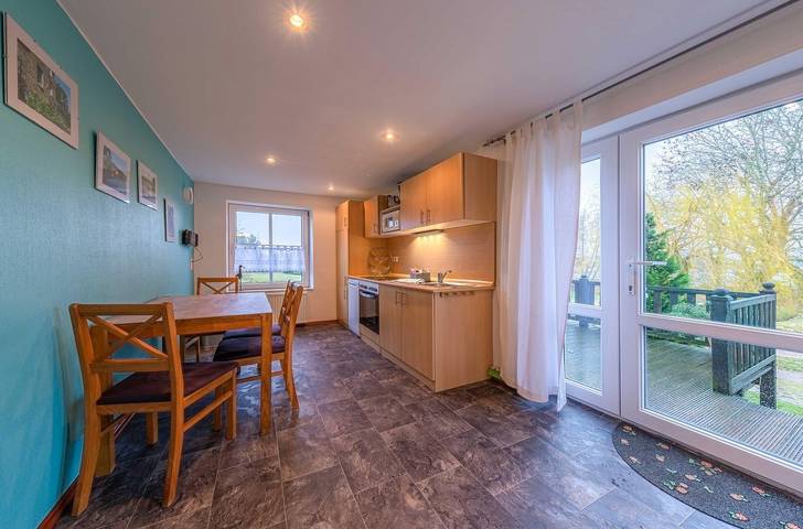Ferienwohnung für 4 Personen, mit Terrasse und Garten sowie Sauna und Seeblick in Schorssow - 2