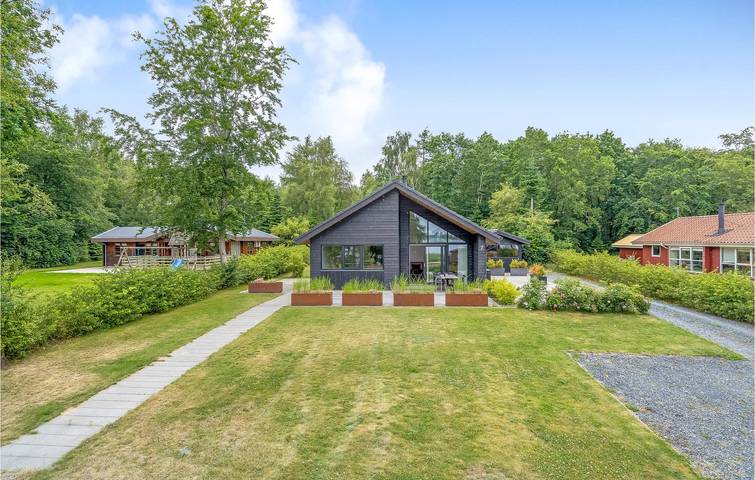 Ferienhaus für 4 Personen mit Terrasse in Sunds, Sunds Sø
