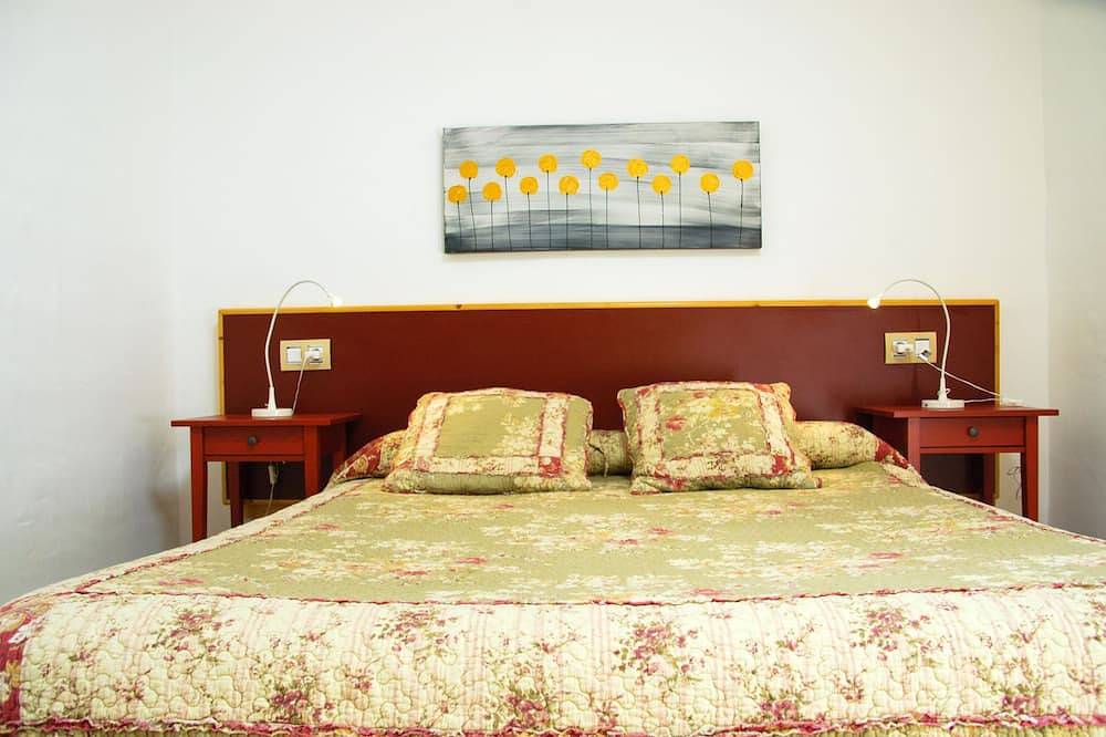 Apartamento con jardín privado, piscina climatizada comunitaria, Tv Satélite in Tahiche, Teguise