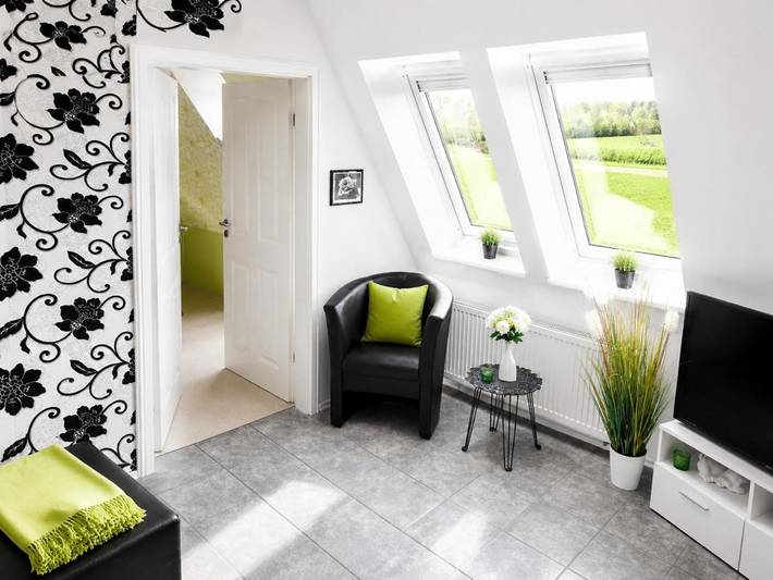 Ferienwohnung für 2 Personen, mit Balkon und Terrasse sowie Garten und Ausblick in Grünendeich - 2