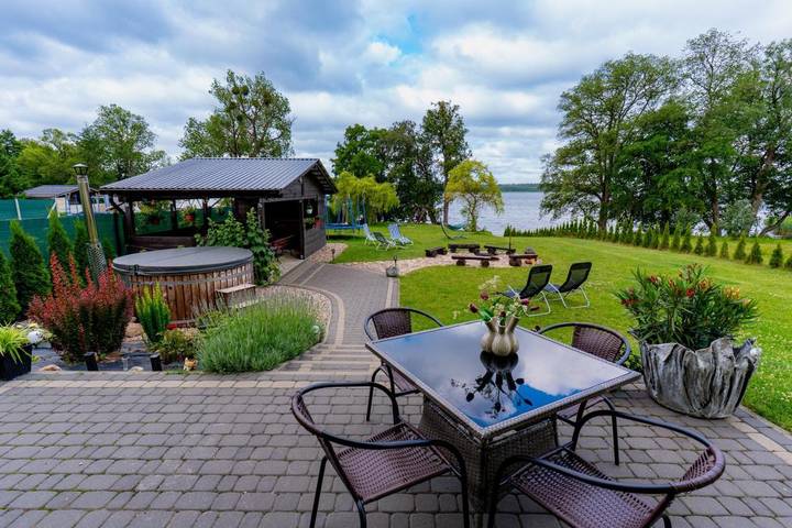 Ferienwohnung für 10 Personen, mit Seeblick und Ausblick sowie Sauna und Garten, mit Haustier in Polen