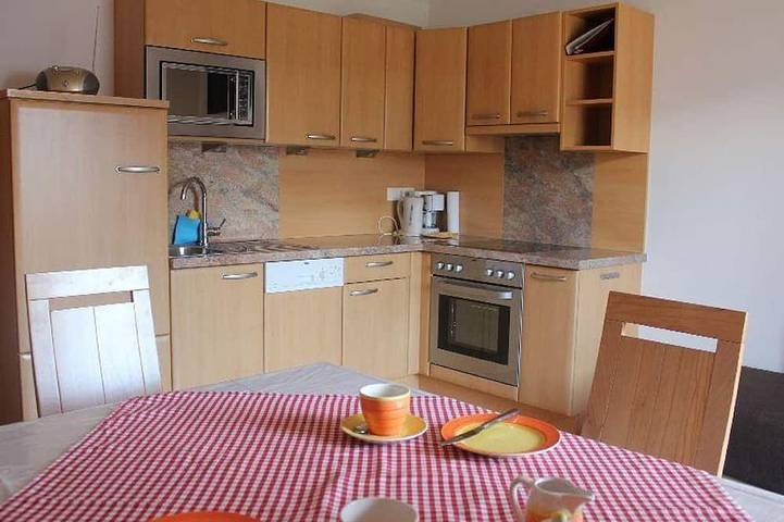 Ferienhaus für 4 Personen, mit Balkon und Garten