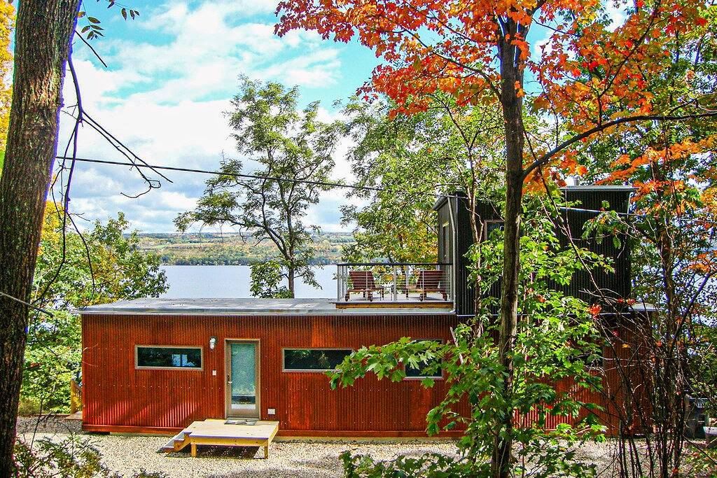 Lakefront contemporary gem with decks, lake views & pebble beach in Seneca Lake