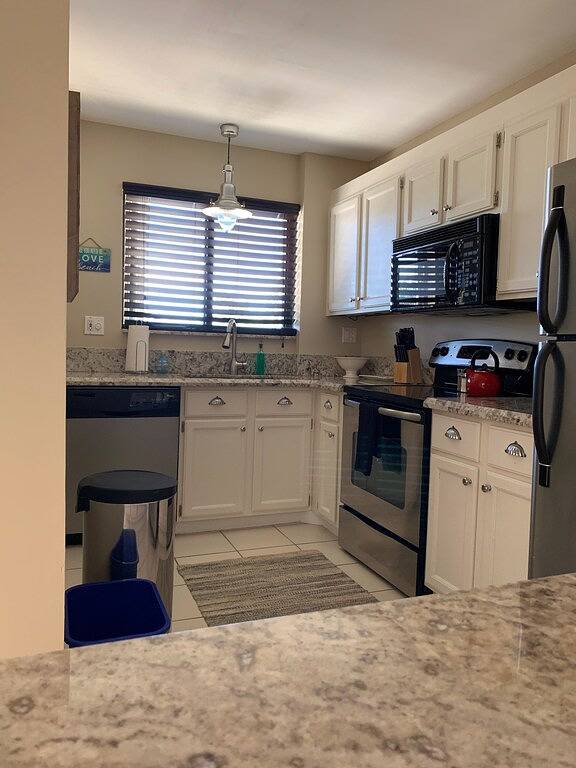 Ganze Wohnung, Praktisch am Strand, gehen Sie einfach über den Carlin Park zum Sand !! ❤️💛💚 in Jupiter, Palm Beach County