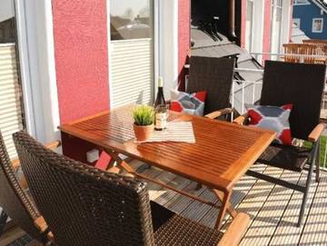 Ferienwohnung für 4 Personen, mit Seeblick und Balkon in Börgerende-Rethwisch