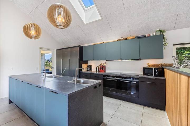 Activity holiday home in Blåvand with pool table, swimming pool and outdoor hot tub in Blavand, Varde Region