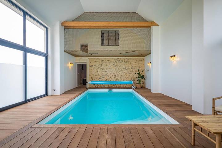 Maison de vacances pour 12 personnes, avec Terrasse et Jacuzzi ainsi que Jardin et Piscine