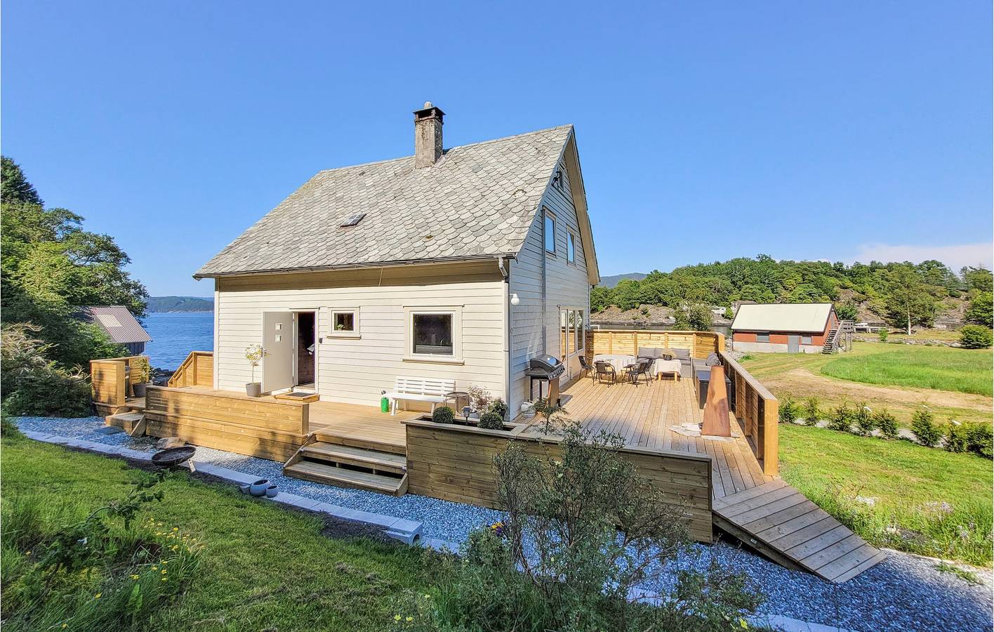Ferienhaus für 10 Personen mit Garten in Fitjar