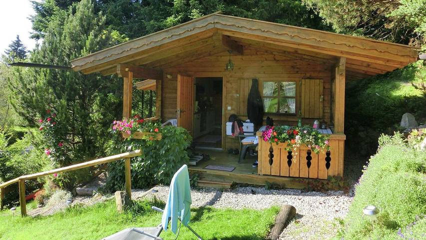 Ferienhaus für 3 Personen, mit Terrasse und Seeblick sowie Garten - 1
