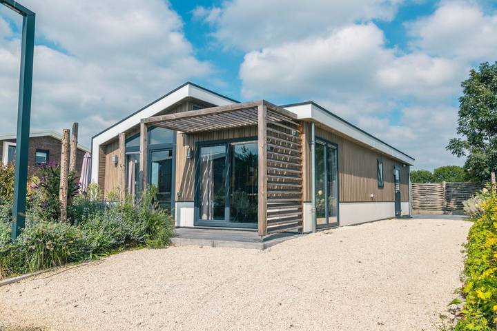 Ferienhaus für 8 Personen, mit Balkon/Terrasse und Terrasse sowie Garten