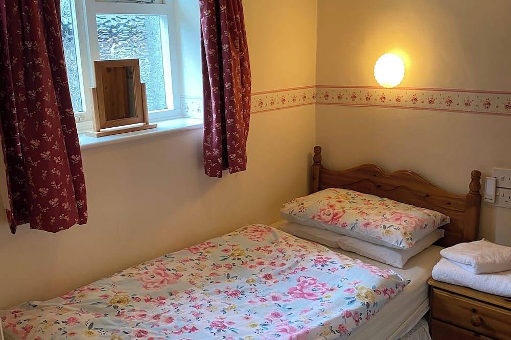 Traditional lakeland cottage refubished without losing old world charm, Car park in Grasmere, Lake District