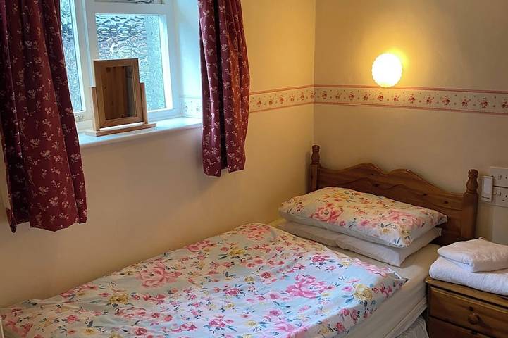Traditional lakeland cottage refubished without losing old world charm, Car park in Grasmere, Lake District