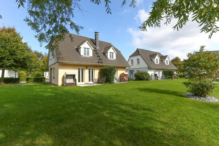 Bungalow für 6 Personen, mit Terrasse und Garten sowie Ausblick