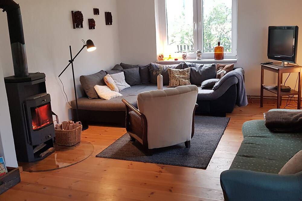 Holiday house with a large garden and swimming lake in the village in Carmzow-Wallmow, Uckermark