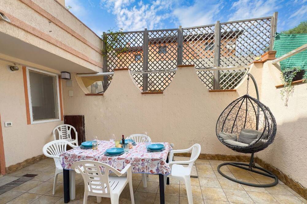 Ganze Wohnung, Platz, Komfort und Entspannung in Mandriola, nur wenige Schritte vom Meer entferntentdecke das Apartment Conchiglia, eine geräumige und komfortable Dreizimmerwohnung in Mandriola, nur 3 Gehminuten vom Strand entfernt – ideal für alle, die einen erhol in Mandriola, Sardinien