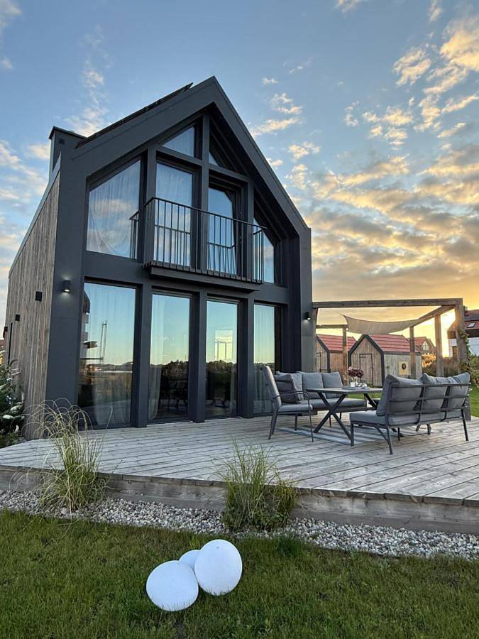 Ferienhaus für 6 Personen, mit Ausblick und Garten sowie Terrasse und Seeblick, mit Haustier