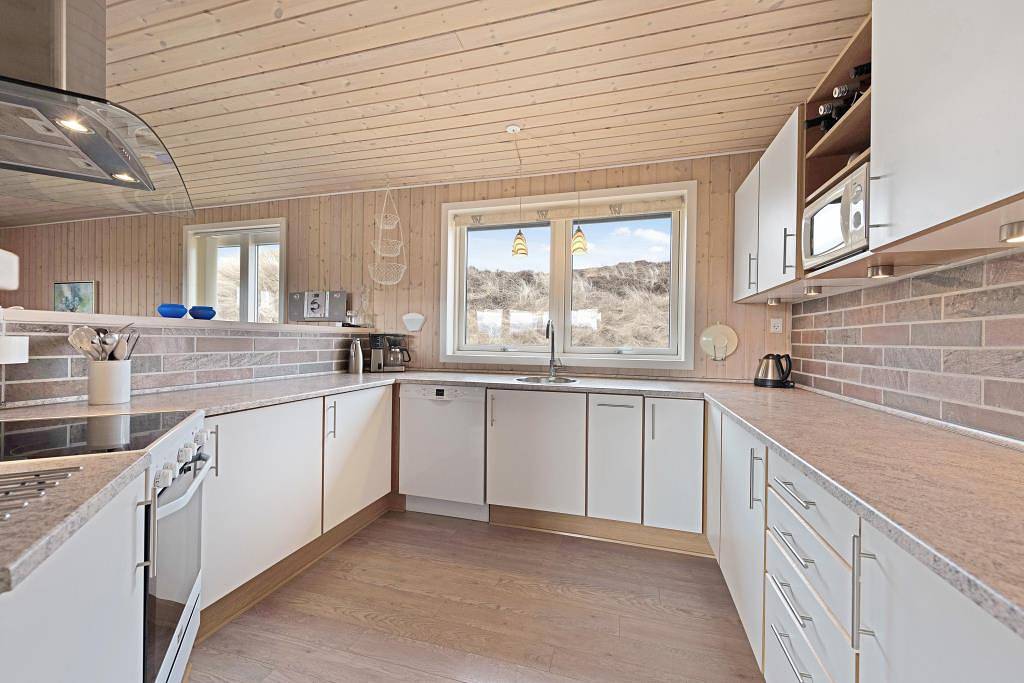 Cosy holiday home with sauna and wood-burning stove in Henne, Varde Region