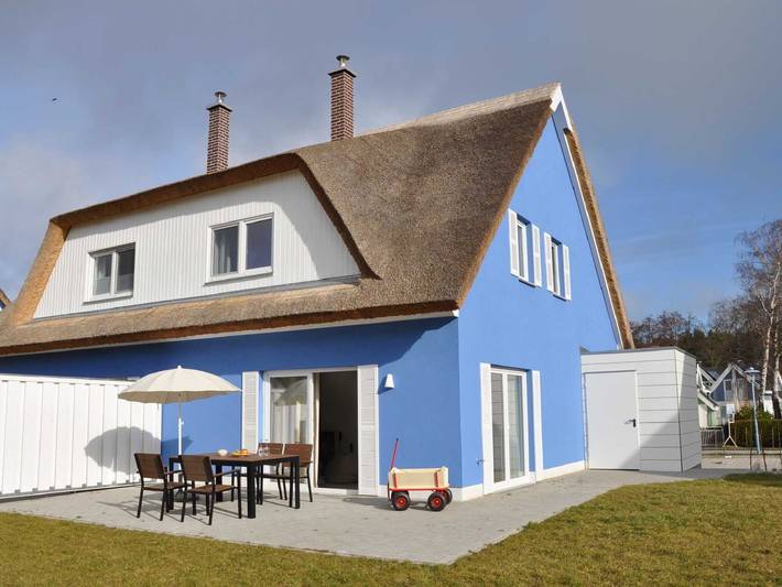 Ferienhaus für 7 Personen, mit Garten und Sauna sowie Terrasse und Seeblick, kinderfreundlich in Breege