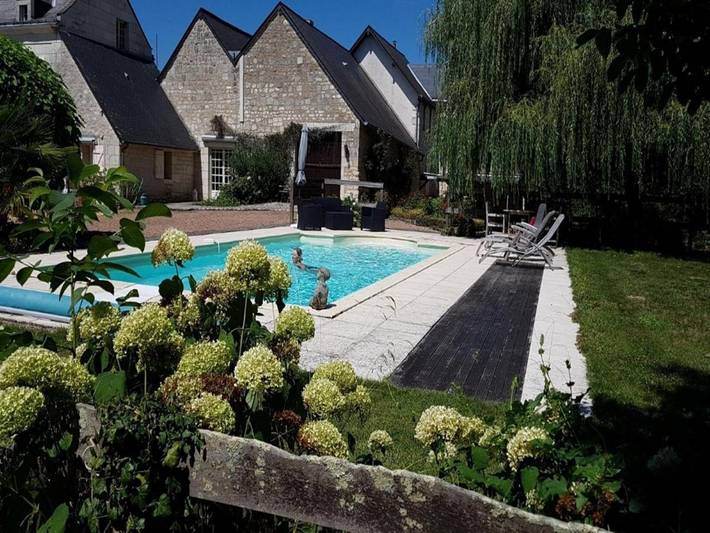 Maison de vacances pour 3 personnes, avec terrasse ainsi que jardin et piscine