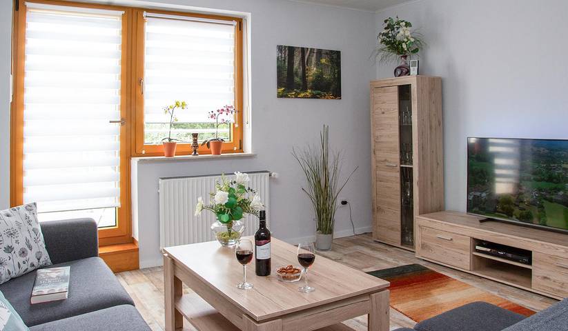 Ferienwohnung für 3 Personen, mit Balkon und Terrasse sowie Garten