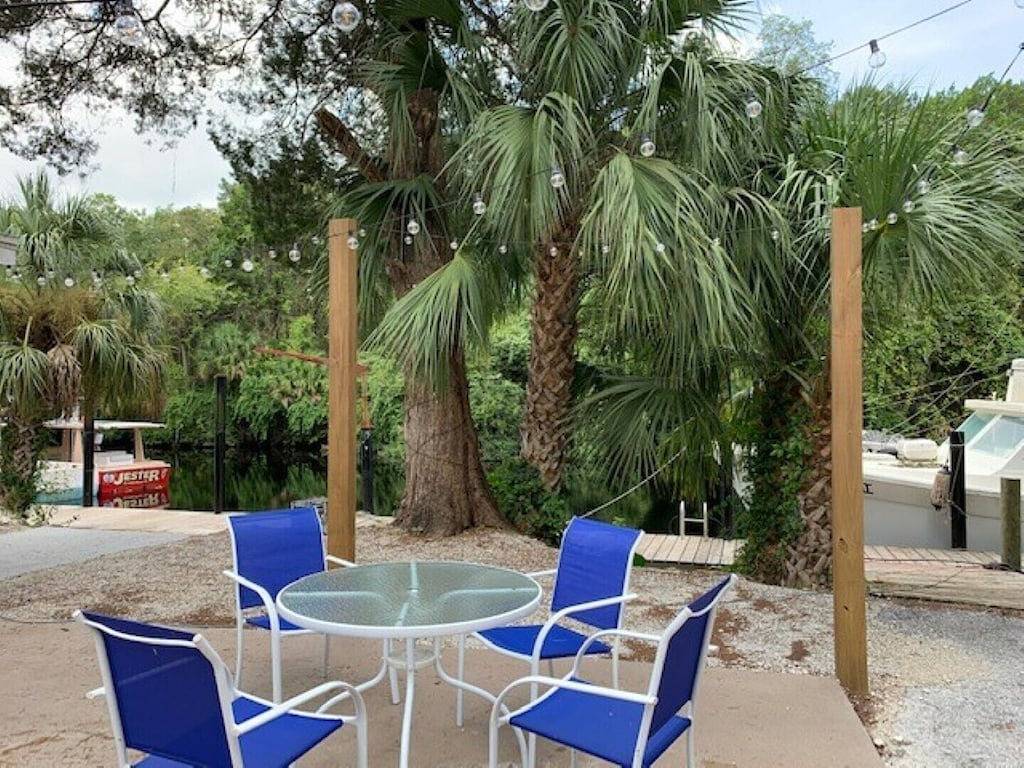 Rustic newly remodeled River House on working fish house property . Gulf access in Inglis, Levy County