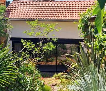 Location de vacances pour 2 personnes, avec piscine et jardin à Saint-Leu-la-Forêt