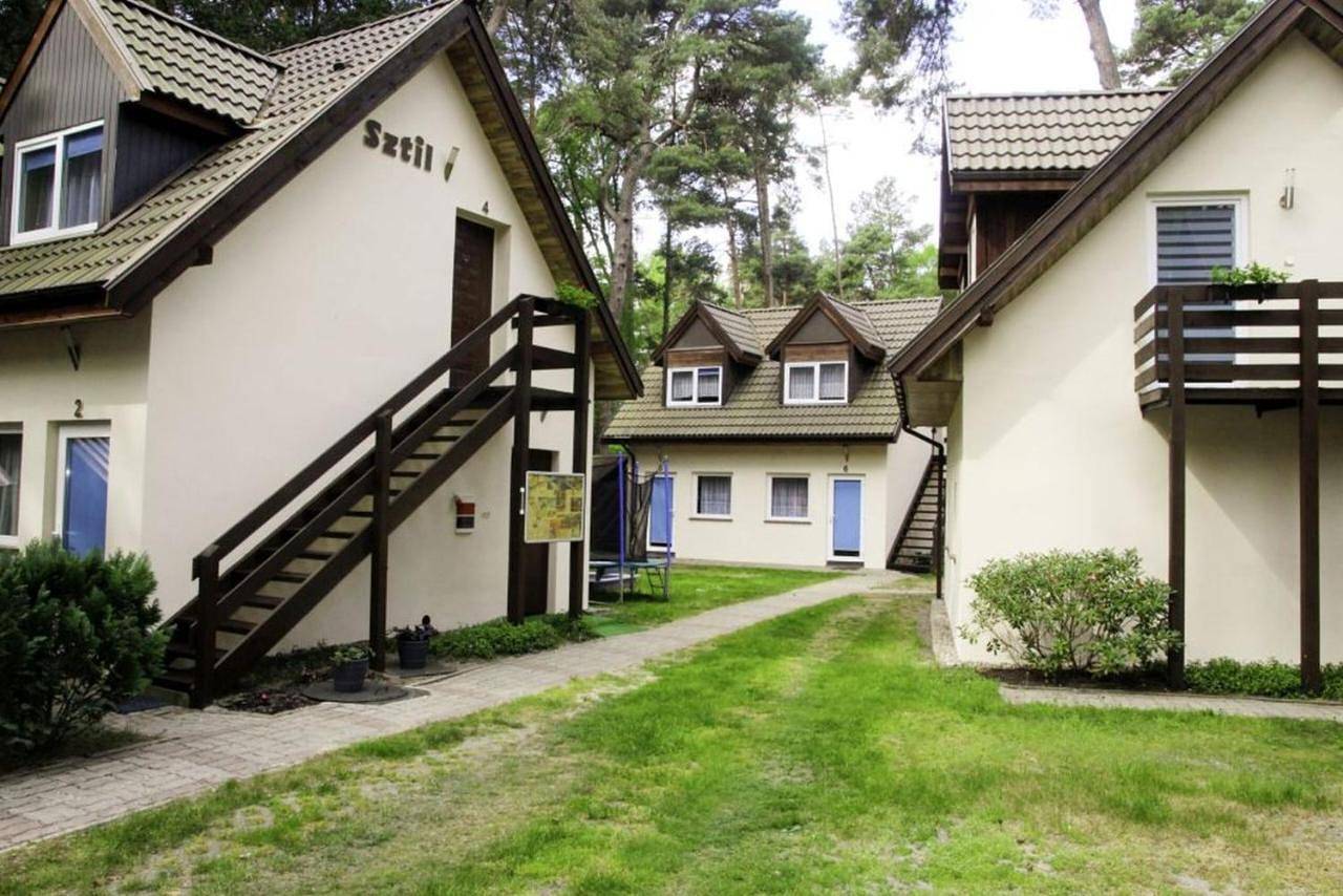 Sztil - Apartamenty i drewniane domki in Pobierowo, Powiat gryficki
