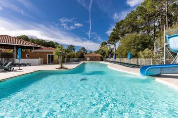 Chalet 'Bois lac de Biscarrosse' avec piscine chauffée, jardin privé & Wi-Fi