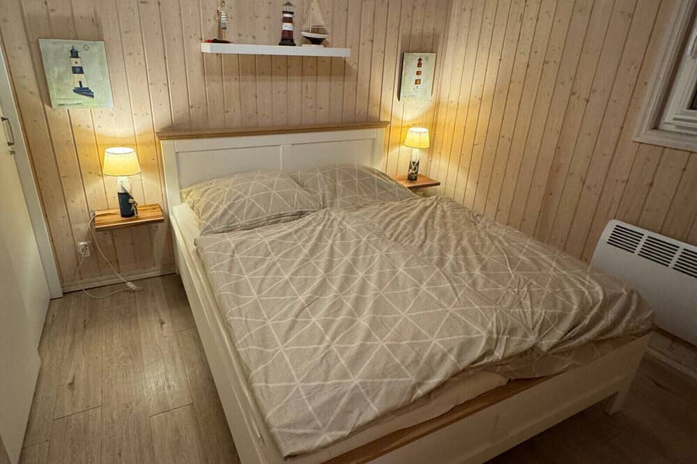 Ferienhaus Villa Hügel 222 in Baabe mit Meerblick. Kinderfreundliche Ausstattung. Stilvolles Wellnessbad mit Sauna & Whirlpool. Ladestation für Elektroautos – ideal für eine komfortable Anreise in Strand Baabe, Baabe