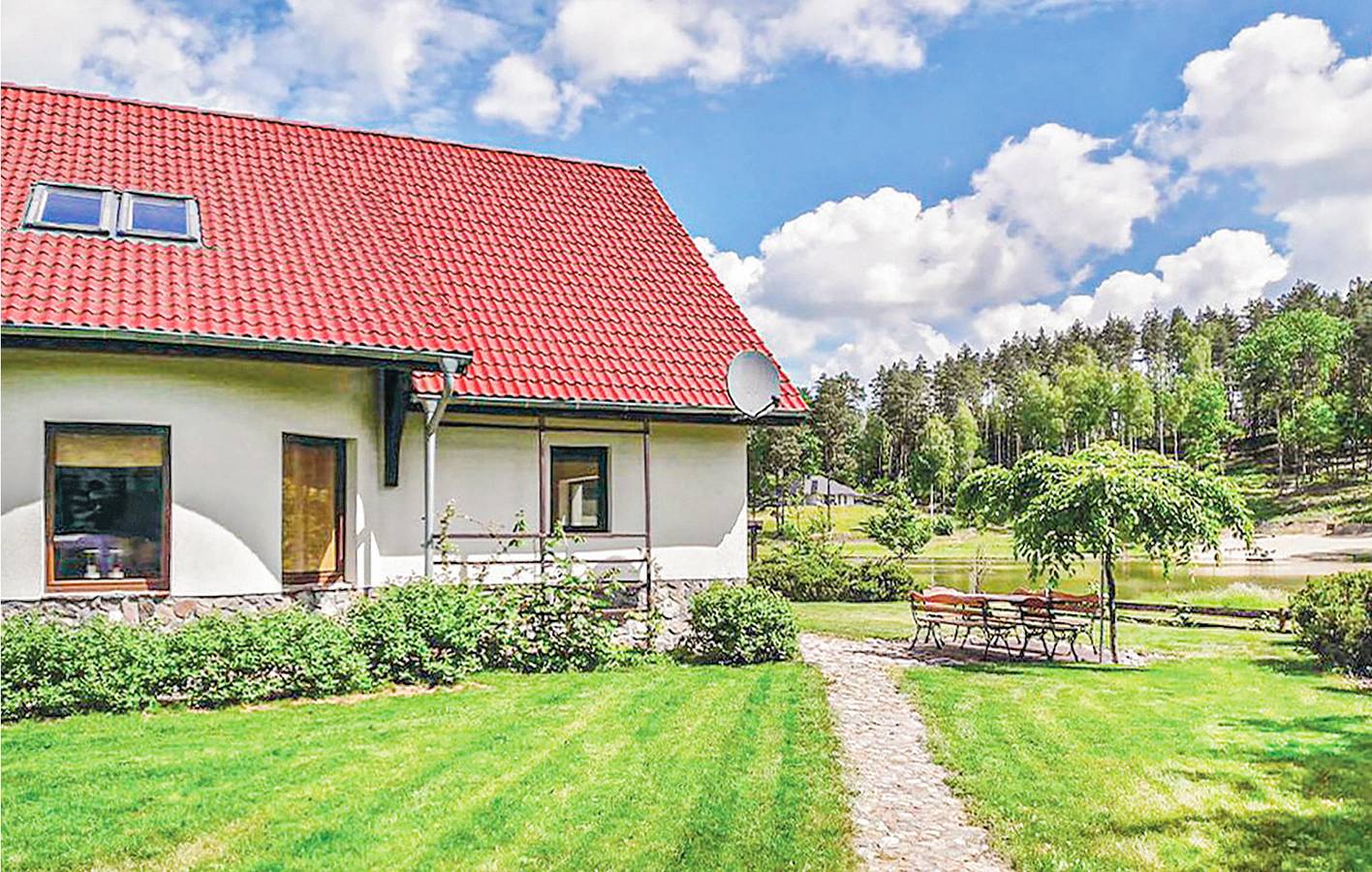 Ferienhaus für 8 Personen mit Terrasse in Powiat Olsztyński