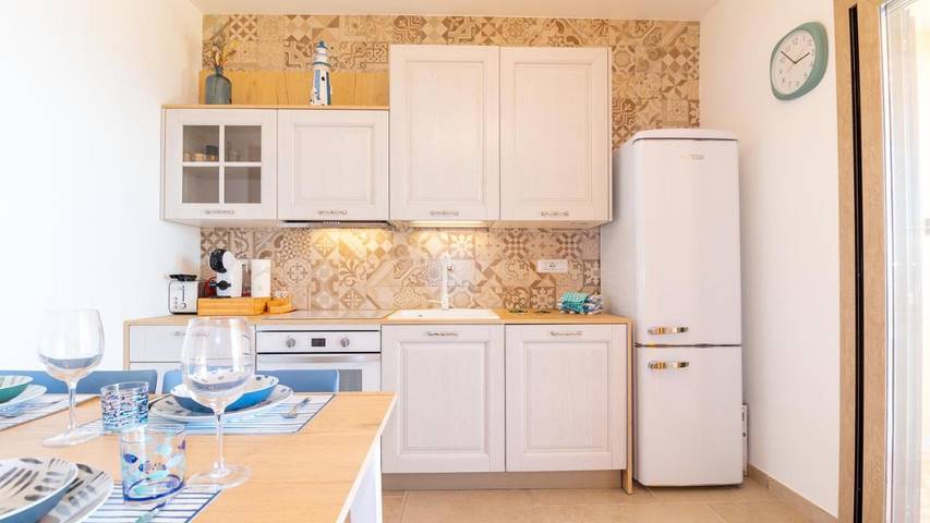 Appartement de vacances pour 4 personnes, avec jardin