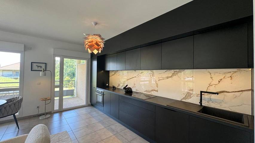 Appartement de vacances pour 6 personnes, avec Terrasse ainsi que Jardin et Vue