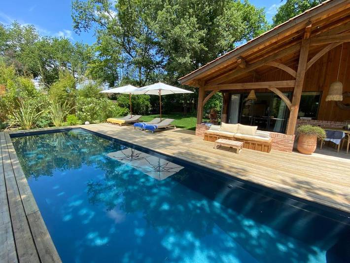 Location de vacances pour 2 personnes, avec terrasse ainsi que piscine et jardin à Belin-Béliet - 3