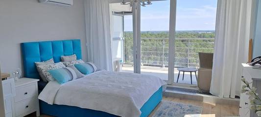 Ferienwohnung für 2 Personen, mit Seeblick und Garten sowie Ausblick in Dziwnówek