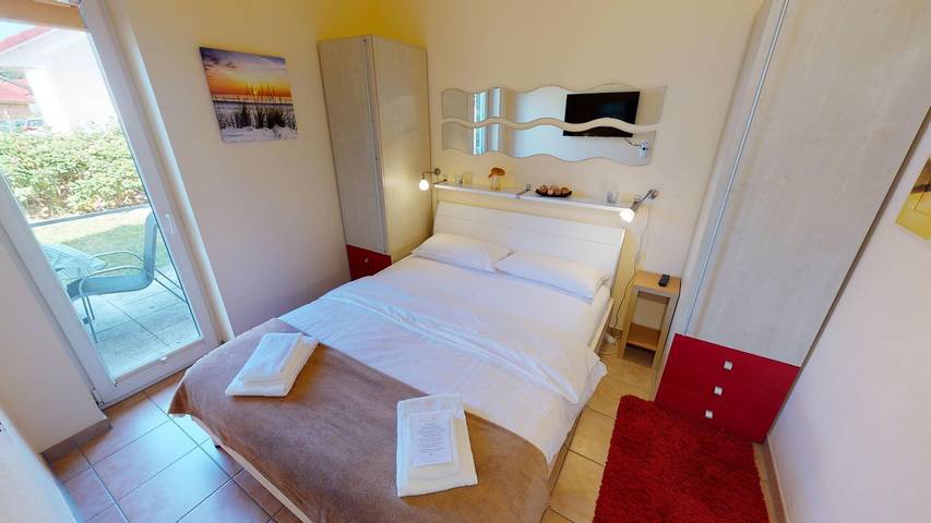 Ferienhaus für 4 Personen, mit Terrasse und Garten sowie Sauna in Neustadt in Holstein - 4