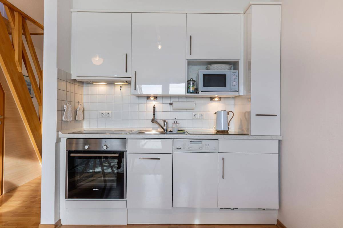 Ganze Ferienwohnung, Inselblume 18 - Ferienwohnung mit Meerblick & Galerie in der Strandburg in Ostfehmarn, Fehmarn