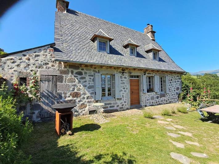 Location de vacances pour 9 personnes, avec Jardin à Thiézac